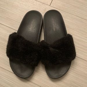 Black fluffy slides
